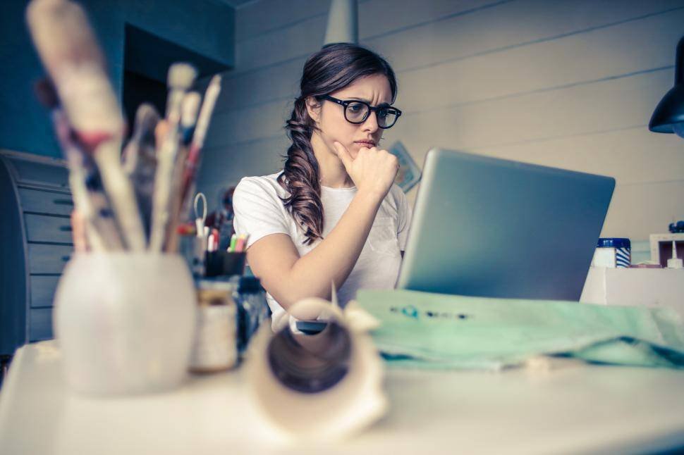 a young woman working on her laptop